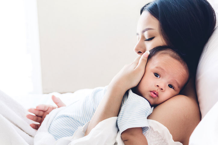 Mother saving baby with AED